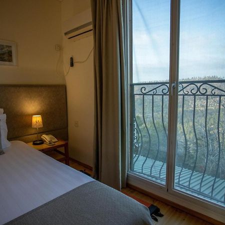 Logos Hotel In Yad Hashmona Extérieur photo